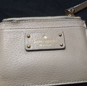 Kate Spade brand cream color coin wallet